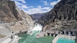 世界首座300米級(jí)低熱水泥混凝土特高拱壩全線貫通！