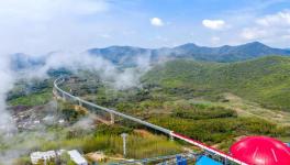 總長13.5公里！空中水泥熟料運輸長廊試運行！